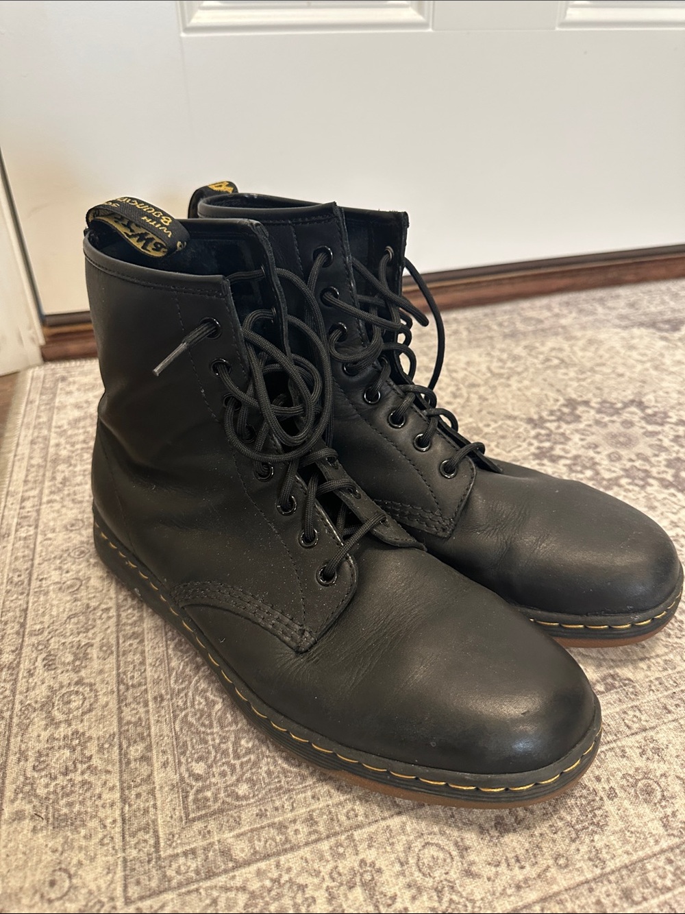 Dr. Martens Black Leather 8-Eye Lace-Up Boots with Yellow Stitching